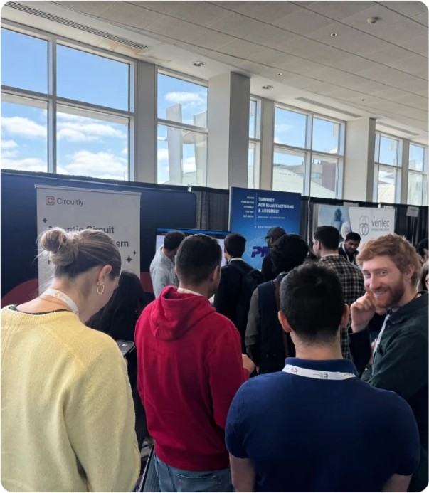 Engineers gathered at the Circuitly booth at PCEA